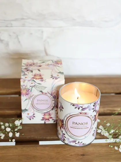 This floral-printed scented candle, with its matching gift box, is a perfect example of our commitment to beautiful design. It’s a gift that looks as good as it smells.