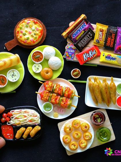 A collection of my most popular miniatures, including pizza, dosa, and chocolates.