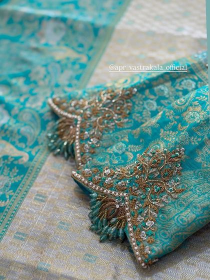 Another view of the turquoise brocade blouse.