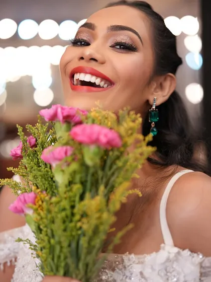 A joyful, laughing shot. Capturing these moments is part of the art, and the makeup needs to hold up.