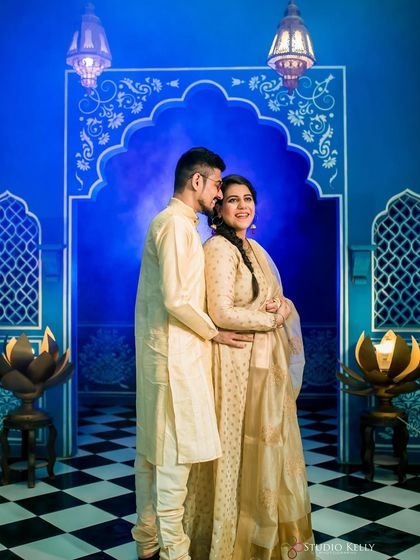 A traditional look for a pre-wedding shoot. The makeup is elegant and timeless, with a beautiful braided hairstyle.