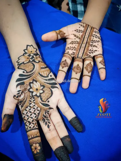 A beautiful example of a teacher and student's work side-by-side, showing a bold Arabic design and a delicate leaf pattern.