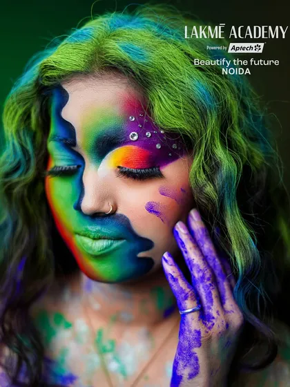 A vibrant and colorful Holi-themed fantasy makeup look. This image showcases creative use of color and texture to celebrate the festival of colors in an artistic way.