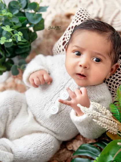 An expressive, wide-eyed look from this little one. Awake shots during a newborn session are a wonderful bonus, showing a completely different side of your baby.