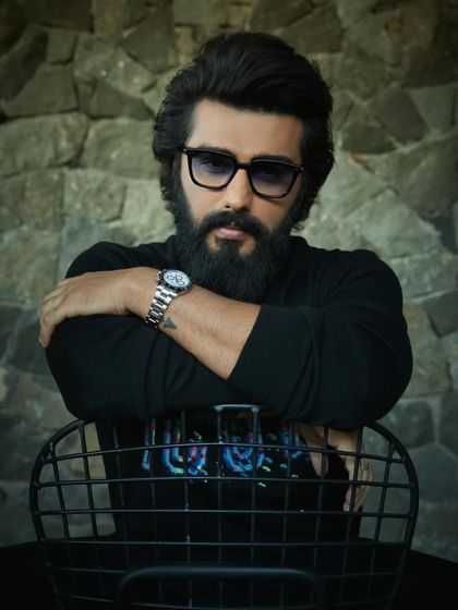 A strong portrait of Arjun Kapoor from the Exhibit Magazine shoot. The all-black Dsquared2 knit and bold sunglasses create a sense of mystery and intensity, perfect for a compelling editorial feature.