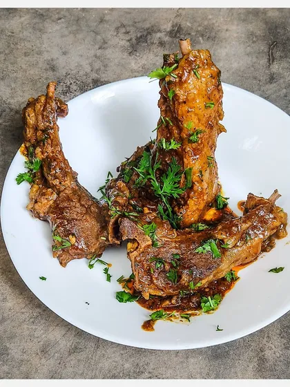 This is my Bannur Mutton Chops Pepper Fry, a dry and intensely flavourful preparation. I slow-cook the fatty chops in their own rendered fat with a generous amount of freshly ground black pepper until the meat is succulent and falling off the bone.