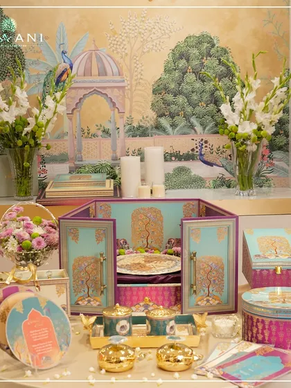 Here is a complete view of the Tree of Life collection, a vibrant suite designed to celebrate new beginnings. It includes the central hamper, coordinated gift boxes, stationery, and artisanal jars, all tied together with motifs of peacocks and elephants for a cohesive and meaningful story.