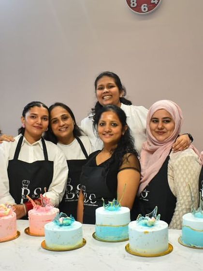 A happy group photo from our first week of the masterclass, where everyone learned the fundamentals of whipped cream and isomalt.