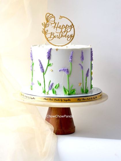 Another angle of the lavender floral cake, showing how the design wraps around the side.