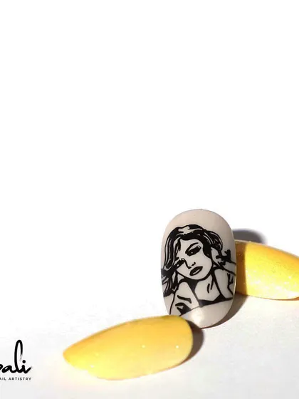 A simple yet effective stamping design of a woman's portrait.