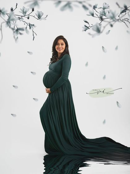 Another variation of the water reflection portrait, this time with a full-length view that emphasizes the graceful train of the green gown.