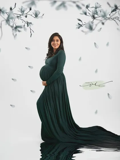 Another variation of the water reflection portrait, this time with a full-length view that emphasizes the graceful train of the green gown.