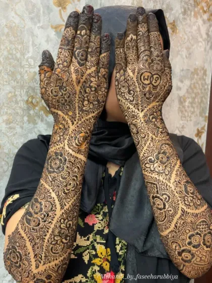 A full view of Shazeen's engagement design, a perfect example of personalized and artistic mehendi.