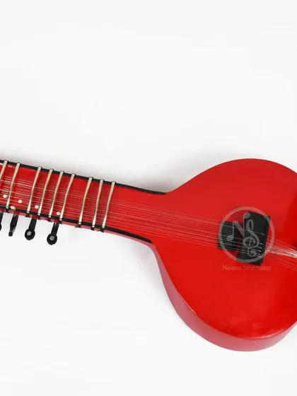 An angled view of the red Zitar, highlighting its simple and effective design.