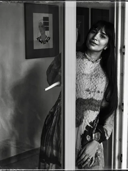 Devanshi, peeking from behind a door. Her gentle smile and the soft light make this a warm and inviting portrait from my 'Doorways' series.