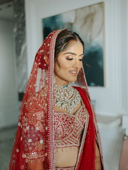A candid moment of the bride, her soft makeup looking serene and beautiful. You'll learn to create looks that are perfect for capturing these precious memories.