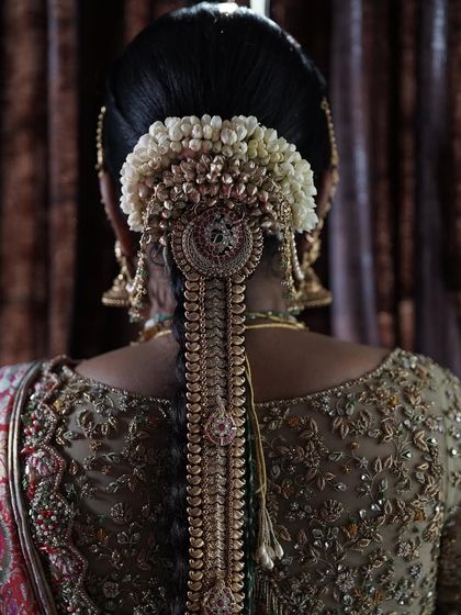 A collection of detailed shots focusing on the diverse and intricate embroidery of my custom blouses. These images highlight the fine craftsmanship, luxurious materials, and unique designs that define my work.