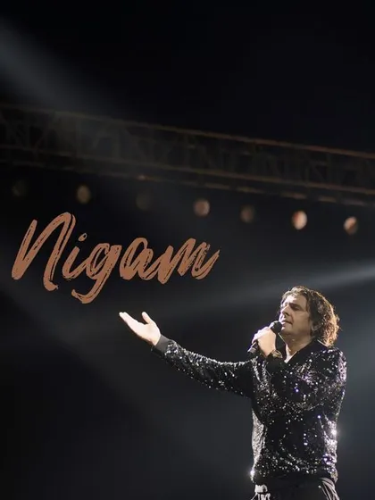 A signature shot of Sonu Nigam, framed by a powerful spotlight. This image was designed to be an iconic portrait, capturing the essence of his stage persona.
