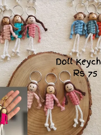 How cute are these little doll keychains? I make each one by hand with a wooden bead for the head and colorful cotton thread for the clothes. They are a huge hit as return gifts for kids' parties!