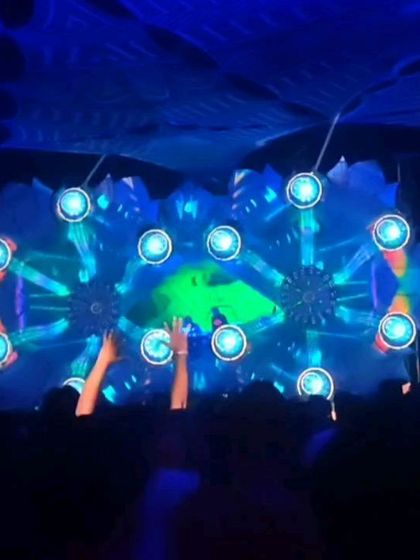 The Hilltop stage at night, with the lights creating a mesmerizing floral pattern. The visual experience is just as important as the audio one.