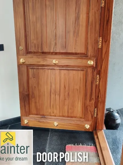 A beautifully finished main door with a natural wood polish. My wood polishing service brings out the grain and character of the wood, providing a premium look and durable protection.