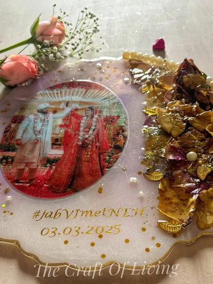 A top-down view of the lavender geode plate, showing the delicate arrangement of flowers and the gold leaf details. This piece was created to celebrate World Art Day.