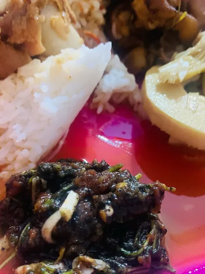 A close-up of my lunch plate, showing a bit of everything. You can see the fermented crab chutney, boiled bamboo shoot, and pork curry with rice.