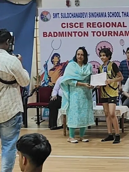Khanak Jhalani receiving her awards at the CISCE regional tournament. Her runner-up in doubles and bronze in singles have earned her a spot at the nationals.