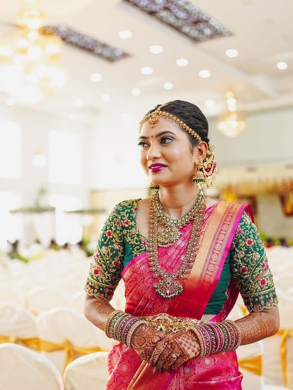 Another angle of the gorgeous pink and green bridal saree look, highlighting the intricate blouse embroidery.