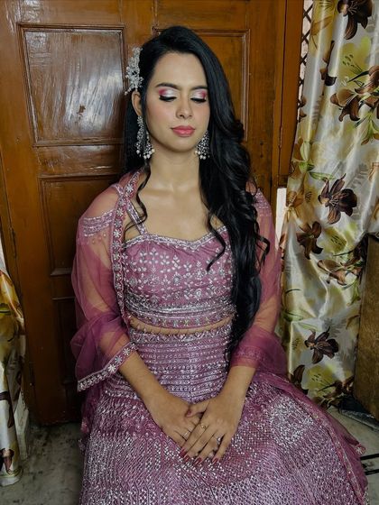 Another seated portrait, capturing the elegance of the look.