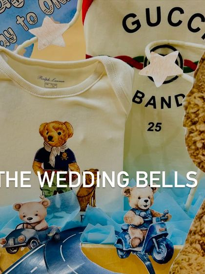 A close-up of the designer baby clothes in our half-birthday hamper. We believe in gifting luxury and style from the very beginning.