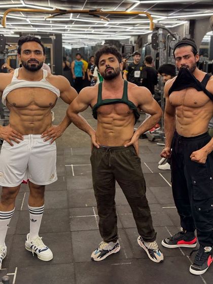 Bhai. Posing with friends in the gym.