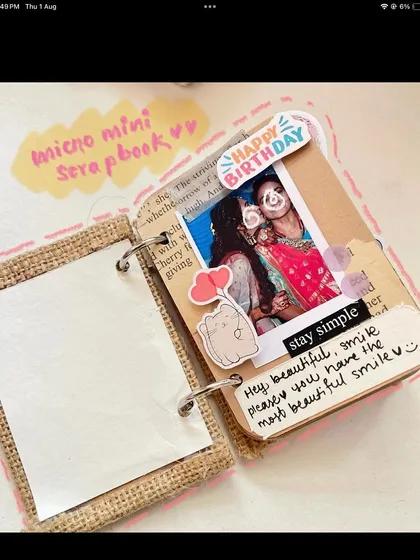 A micro-mini scrapbook for your most cherished memories. This one has a page for a birthday, complete with a photo and a sweet handwritten note. Small in size, but so big on emotion.