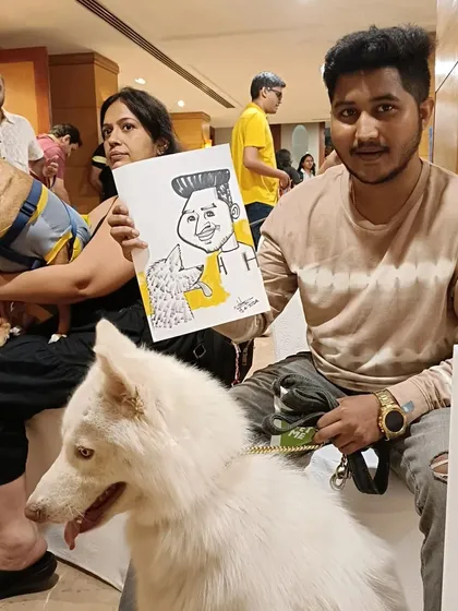 A guest with his white dog, both looking great in their caricature.