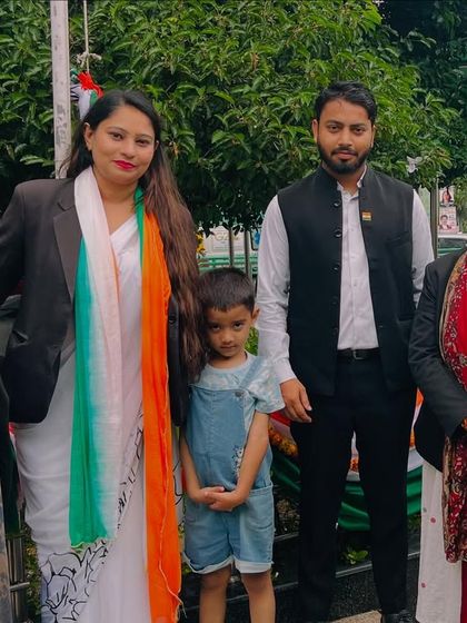 With family and colleagues during Independence Day celebrations.