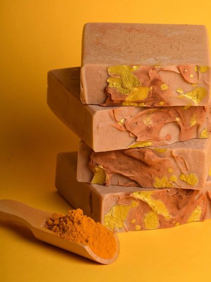 A stack of our Turmeric and Saffron soaps from the Diwali collection. Enriched with Kokum and Mowrah butters, this soap offers a pampering experience with its skin-nourishing properties.