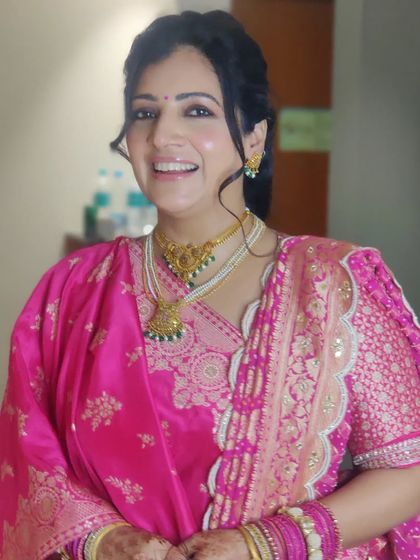 The lovely Gunjan, ready for a wedding event. She is glowing with my signature dewy skin, glossy lips, and soft smokey eyes.