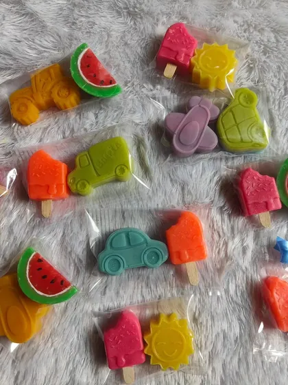 A fun assortment of summer-themed mini soaps for kids, including popsicles, cars, and suns.