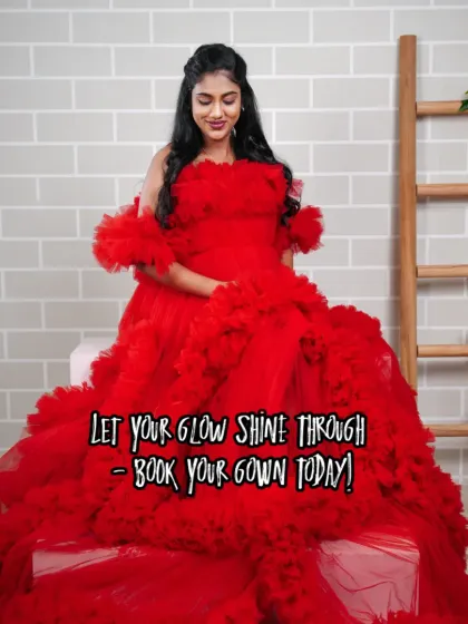 Let your glow shine through in this vibrant red ruffled tulle gown. This dress is designed to be a showstopper for any baby shower or photoshoot.