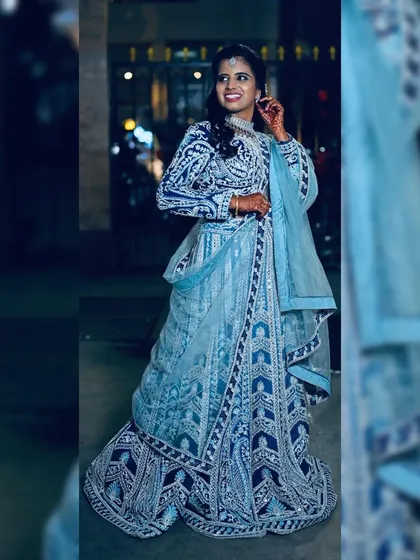 This is for the reception or sangeet night where you want all eyes on you. I designed this stunning ice blue lehenga with intricate, heavy embroidery that sparkles with every movement. It’s a true showstopper available for rent.