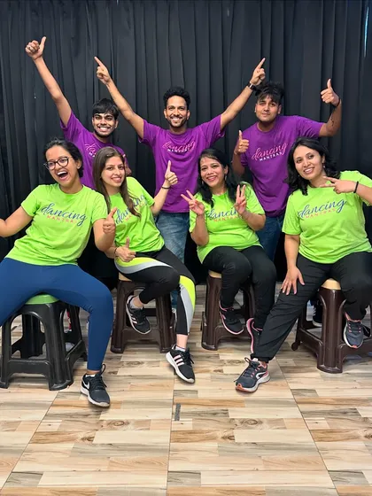 The 'Dancing Diva's' squad having fun behind the scenes. The excitement and camaraderie are a huge part of the experience.