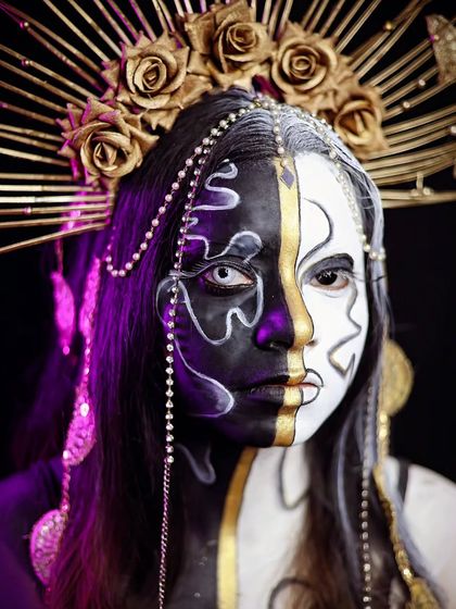 A direct portrait of the split-face look, showing the striking contrast and symmetry.