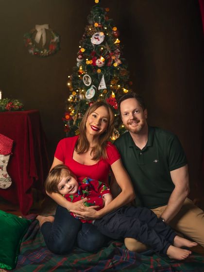 It's always special when a family returns for another shoot. This Christmas portrait captures how much their little boy has grown in a year, making it a beautiful marker of time.