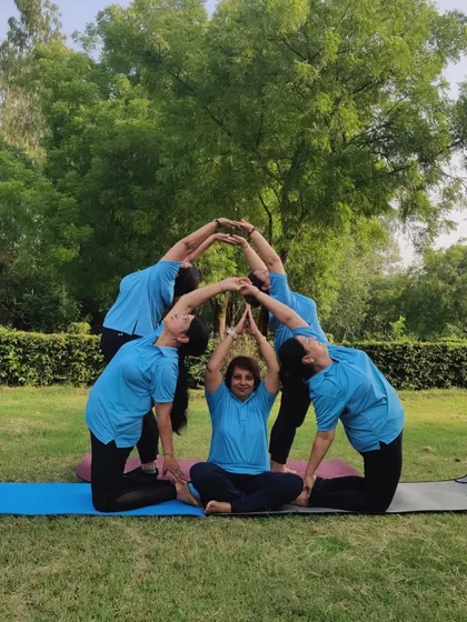 Our yoga community creating a human shelter with their bodies, with me at the center. A beautiful representation of support and togetherness.