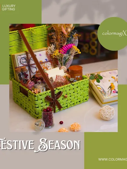 Celebrate the festive season with our eco-friendly green jute hamper. This image shows the hamper filled with treats and adorned with dried flowers for a touch of nature.