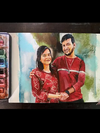 A watercolor portrait of a couple, set against a soft, abstract background. This is a great example of a more modern style.