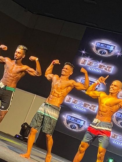 My clients owning the stage at ICN. Their smiles and confident poses show they know they've earned their spot at the top.
