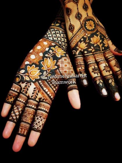 A striking bridal design using negative space to make the lotus motifs pop. This teamwork piece shows how my team and I can create complex, coordinated looks for the bride and her family.