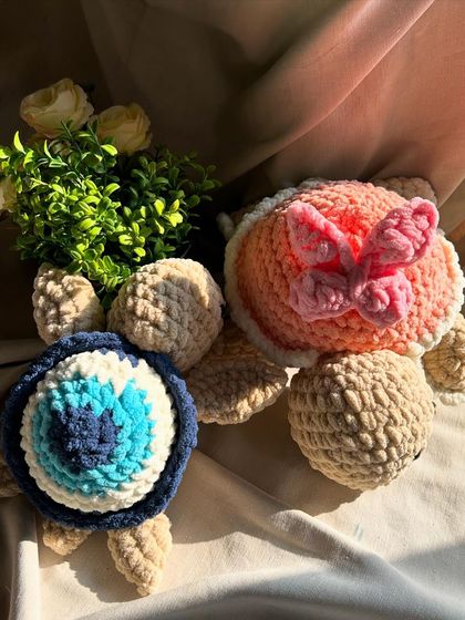 Our two signature large turtles together. We love creating these unique, meaningful designs that are more than just toys.