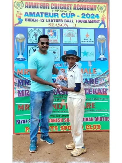 Shreyash Khilare receiving the Player of the Match award for his performance in the Amateur Cup final.